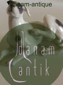 Royal Copenhagen Figur eines liegenden Hundes Nr. 1452/2855