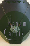 Royal Copenhagen Vedhæng af porcelæn designet af Arje Griegst. Sterling sølv af Anton Michelsen