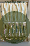 A. Michelsen Sæt af 6 Forgyldte Sterling sølv theskeer med farvet Emalje i æske, plus en ekstra