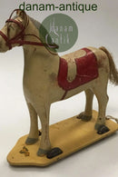 Old toy horse on wheels toy