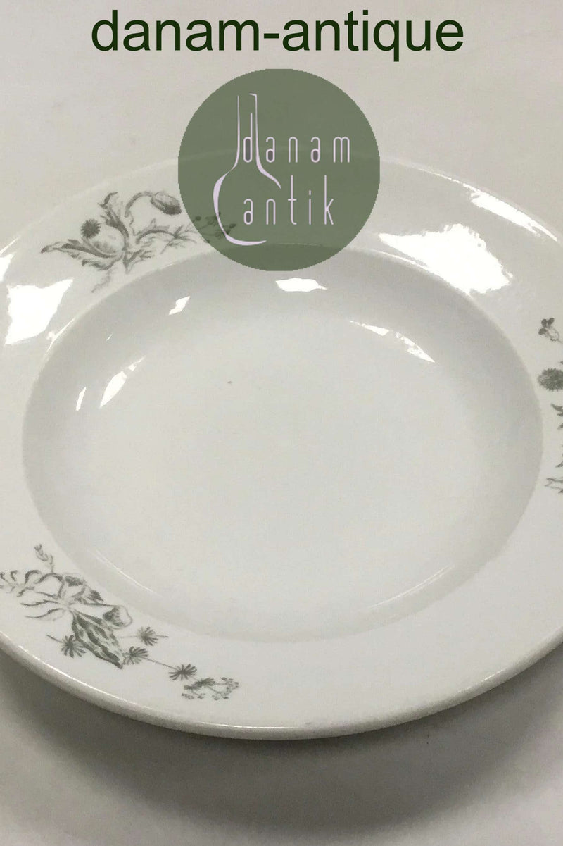 Royal Copenhagen Hotelporcelæn dekoreret med vilde planter Dyb Tallerken No 6002