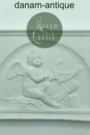 Bertel Thorvaldsen: Royal Copenhagen Porcelæn Biscuit Platte "Amor Virker et Net" No 82.