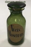 Holmegaard Apotekerflasken, krukke med tekst Nuces Moschatæ fra 1985