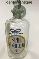 Holmegaard Apotekerflasken, krukke med tekst SPIR COCHLEAR fra 1981