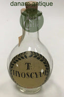 Holmegaard Apotekerflasken, krukke med tekst TR KYOSCYAM fra 1984