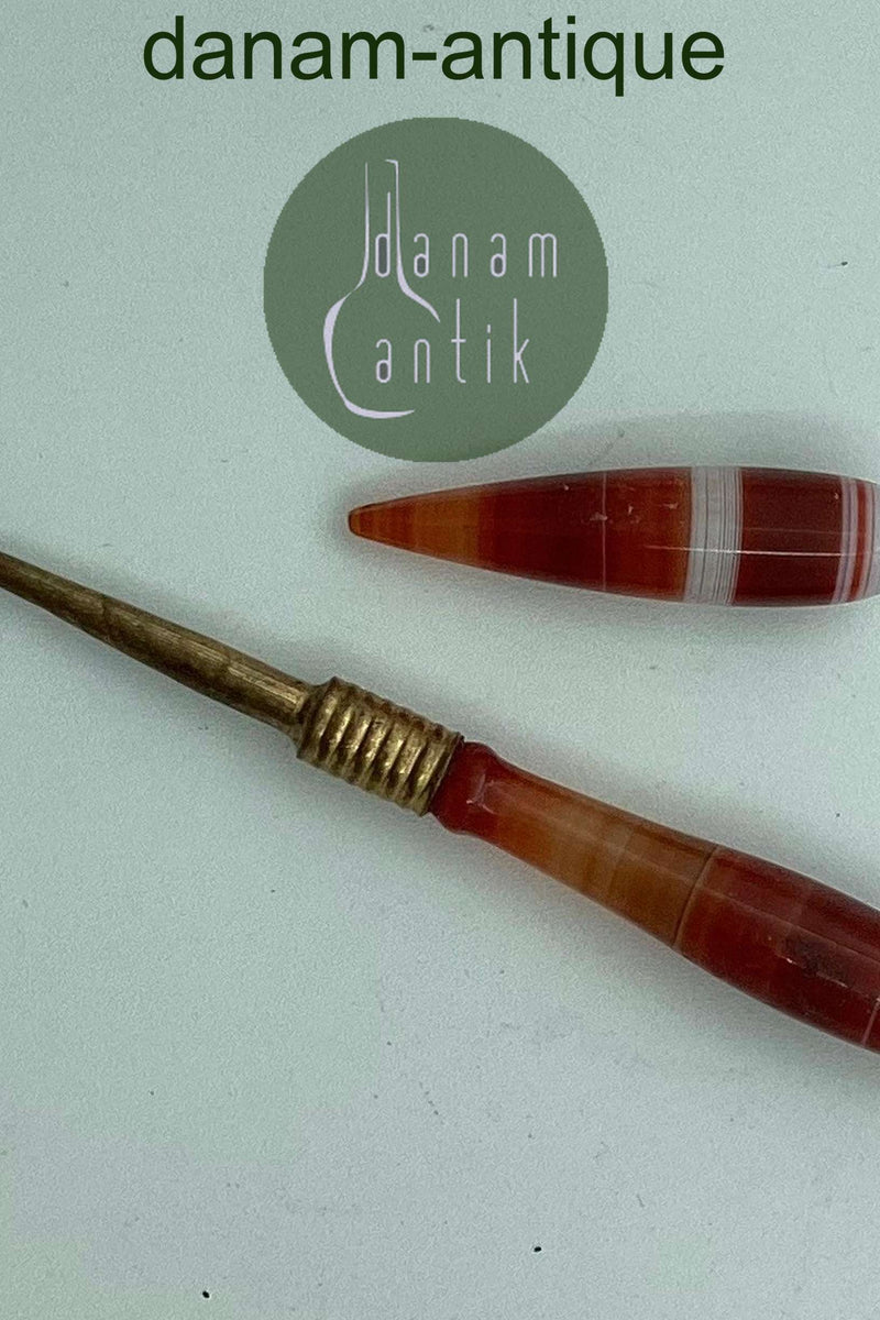 Agat nips. Den ene del "snørrebåndshjælper"  Sælges samlet.