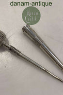 Synål: Sygrej i sølv