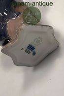 Royal Copenhagen Figur Panda på træstub No. 664