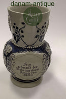 Tysk salt glasur Kande med inskription: Fein Schmeckt Der Wein Aus Einem Krug Von Stein