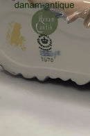 Royal Copenhagen Figur af siddende Dreng og Pige No 4670