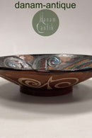 Stentøjsskål i brune, gule og blå nuancer