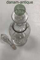 Glaskaraffel med dekoration i guld, hvid og rød