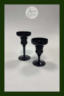 Et par Lysestager i sort glas