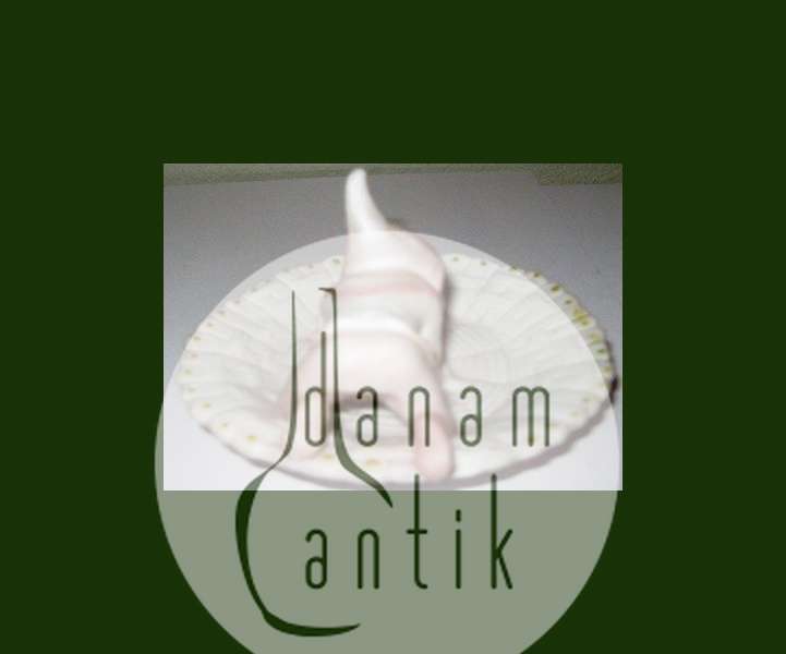 Porcelæns Nissemand på en lille skål