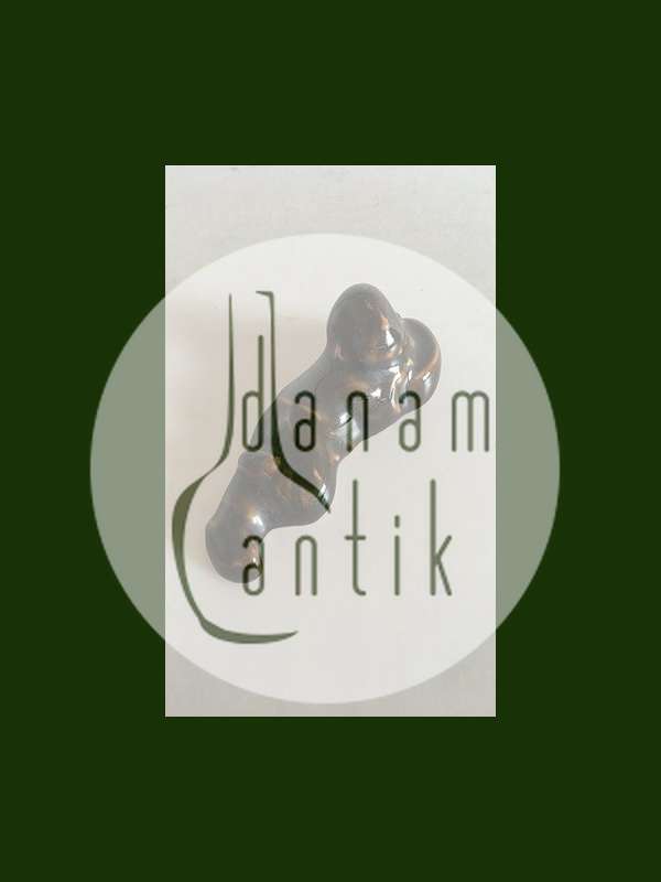 Royal Copenhagen Stentøjs Figur af Lille liggende Budda Dreng. Prøve Glasur