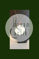 Royal Copenhagen Vedhæng af porcelæn designet af Arje Griegst. Sterling sølv af Anton Michelsen