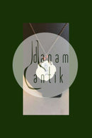 ロイヤルコペンハーゲン Arje Griegstデザインの磁器製ペンダント。アントン・ミケルセンによるスターリングシルバー