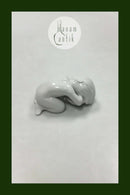 Bing og Grøndahl Blanc de Chine Figur med guld af Havbarn med Konkylie No. 2315