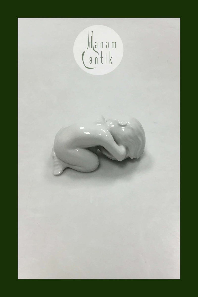 Bing og Grøndahl Blanc de Chine Figur med guld af Havbarn med Konkylie No. 2315