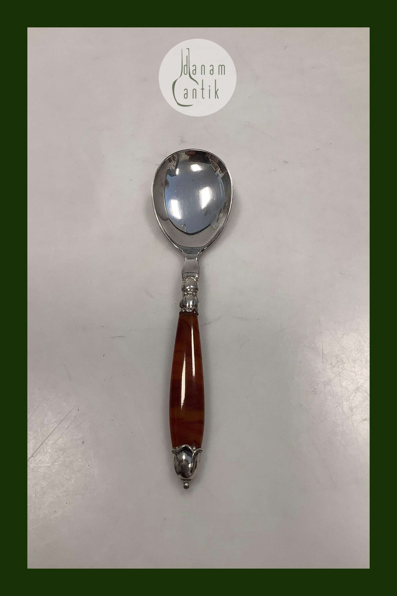 Dansk Ornamental Servingsske med skaft af Immitations Rav