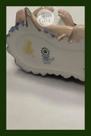 Royal Copenhagen Figur af siddende Dreng og Pige No 4670