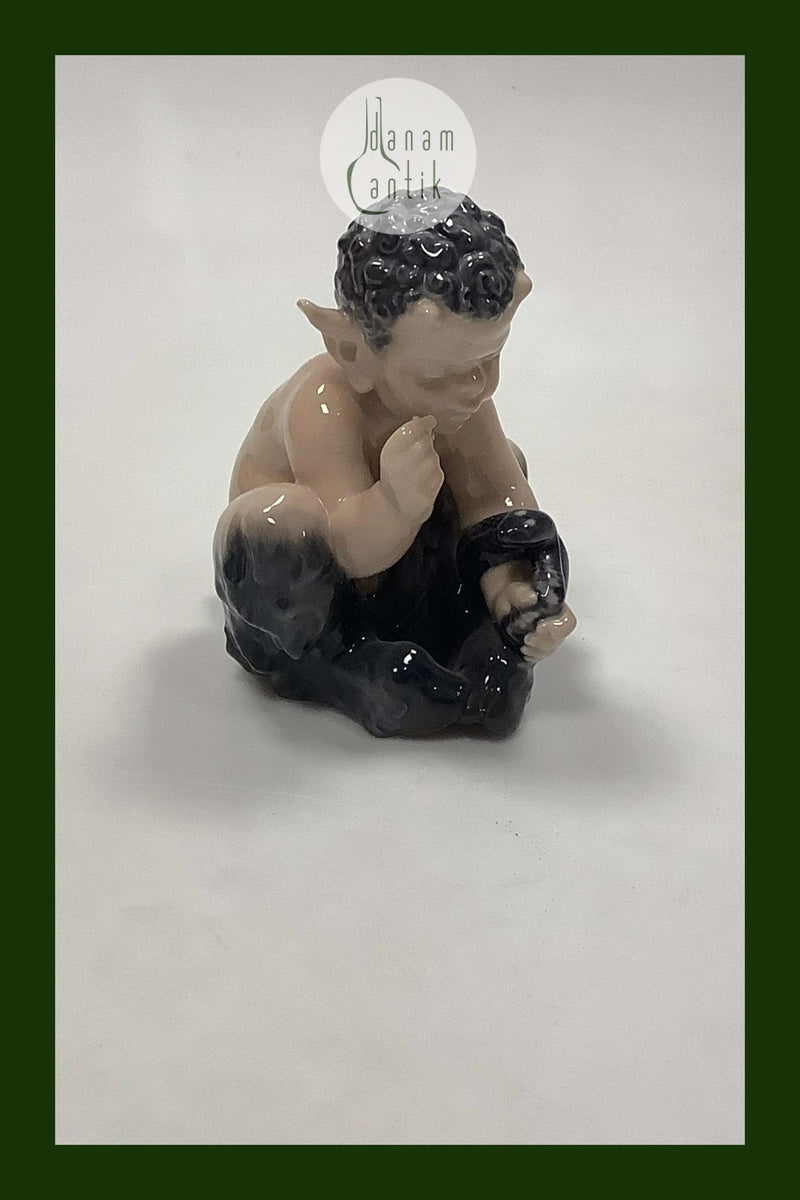Royal Copenhagen Figur Faun med Slange No 1812