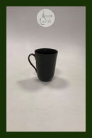 Royal Copenhagen Sort Riflet kop med hank No 497