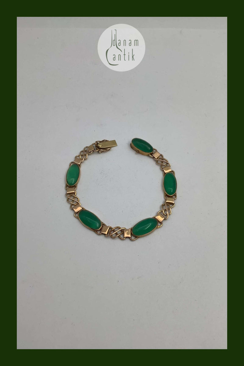14 karat guld armbånd med grønne sten