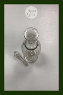 Glaskaraffel med dekoration i guld, hvid og rød