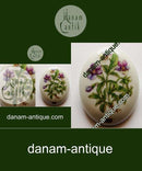 Königliches Kopenhagen. Brosche Flora Danica aus Porzellan