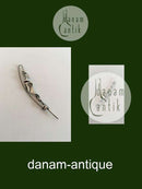 东部地区 来自纯银帽夹或胸针