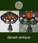 Danish Art Nouveau Brooch with Ambor and Green Stones