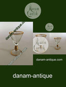 Holmegaard Ida Shot玻璃杯，杯干、杯沿和杯脚都是金色。 