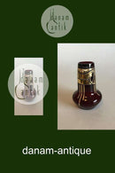 Bordeauxrød vase med gulddekoration