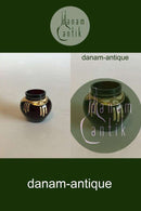 Bordeauxrød vase med gulddekoration