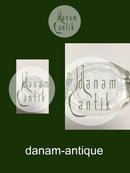 Miniature ashtray in glass.