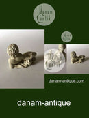 Royal Copenhagen Sjælden figur af nøgen dreng i jern porcelæn