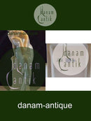 皇家哥本哈根图：坐在石头上的女人 No 568