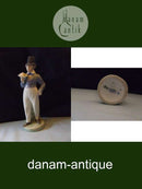 Royal Copenhagen Figurine Boy with Flowers No 1833