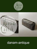 Georg Jensen Lily of the Valley paperweight in steel. A press for a knife handle.