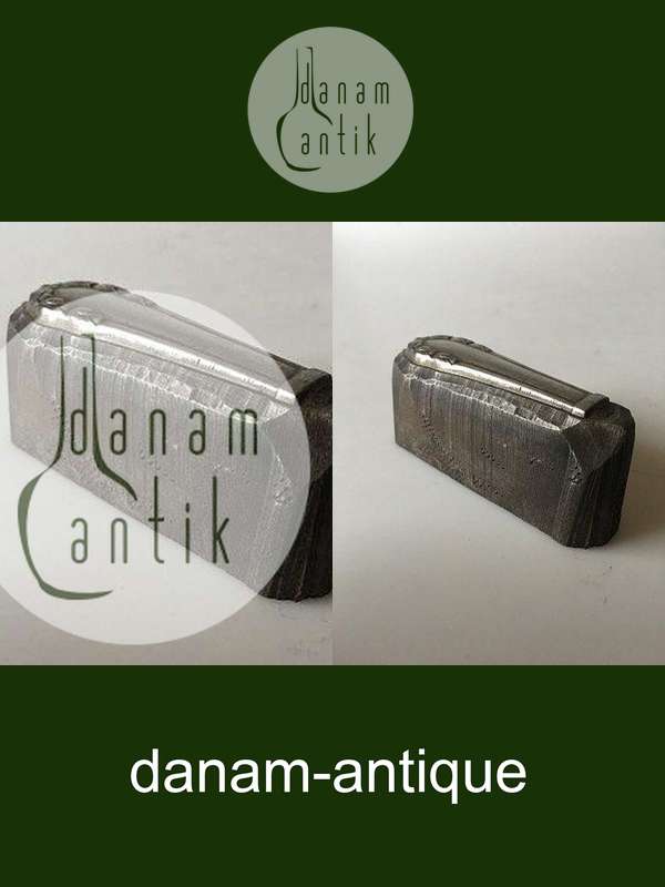 Georg Jensen Lily of the Valley paperweight in steel. A press for a knife handle.