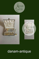 A. Michelsen Vergoldetes Sterlingsilber mit farbiger Emaille. 6er-Set Theskeer plus ein Extra