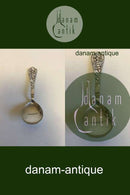 Silver and Stainless Steel Serving Spoon