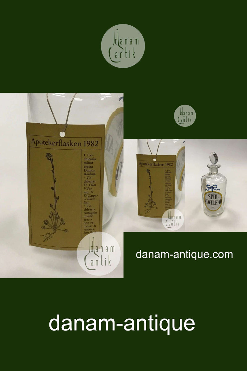 Holmegaard Apotekerflasken, krukke med tekst SPIR COCHLEAR fra 1981