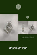 Glaskaraffel med dekoration i guld, hvid og rød