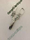 Art Nouveau Silver Scissor with flower motif of puppies