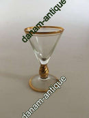 Holmegaard Ida Shot玻璃杯，杯干、杯沿和杯脚都是金色。 