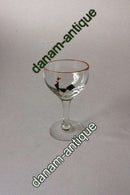 Holmegaard Likørglas dekoreret med sort hane og rød rand.