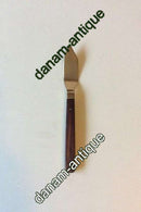 Almue Cohr黄铜和木头，钓鱼刀