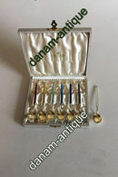 A. Michelsen Vergoldetes Sterlingsilber mit farbiger Emaille. 6er-Set Theskeer plus ein Extra